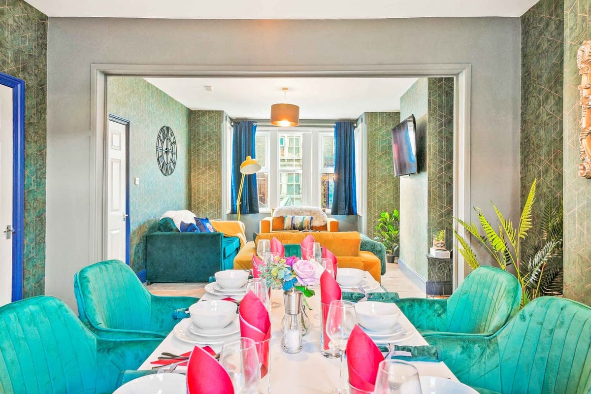 Dining table laid for a group of guests