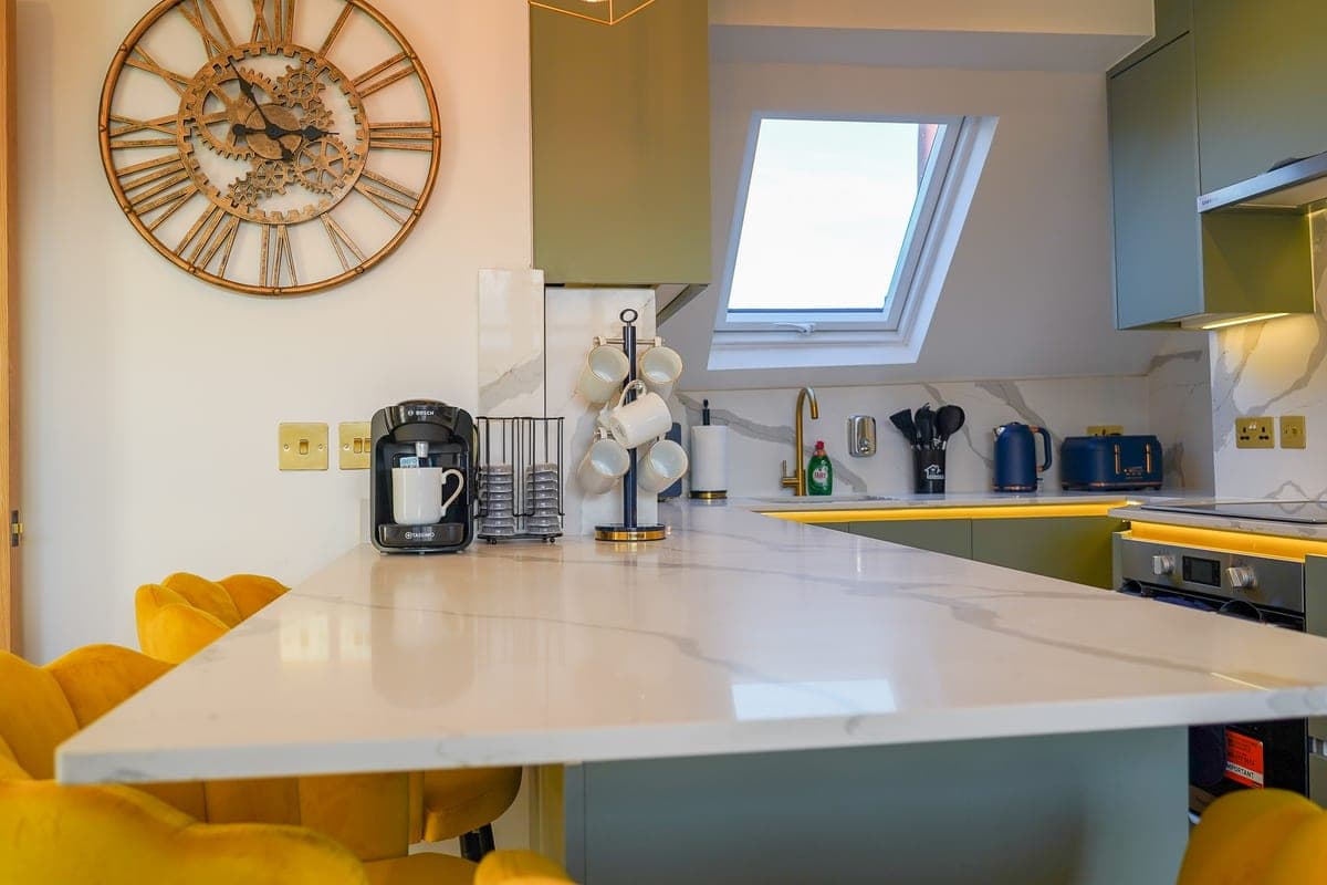 Dining area beneath a tall window