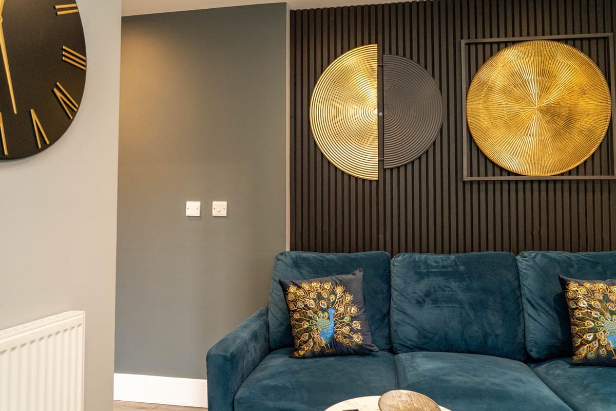 Living and dining space with a wall-mounted television